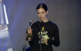 Filmmaker Tom Nesher at Ophir Awards on September 16, 2024, where she received the award for the best feature film, wearing a t-shirt that refers to the remaining 101 hostages held by Hamas in Gaza. (Courtesy)